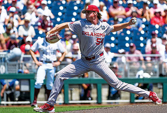 Oklahoma pitcher Jake Bennett throws another strikeout against the Texas A&M Aggies in the opening game of the College World Series in Omaha, Nebraska.
